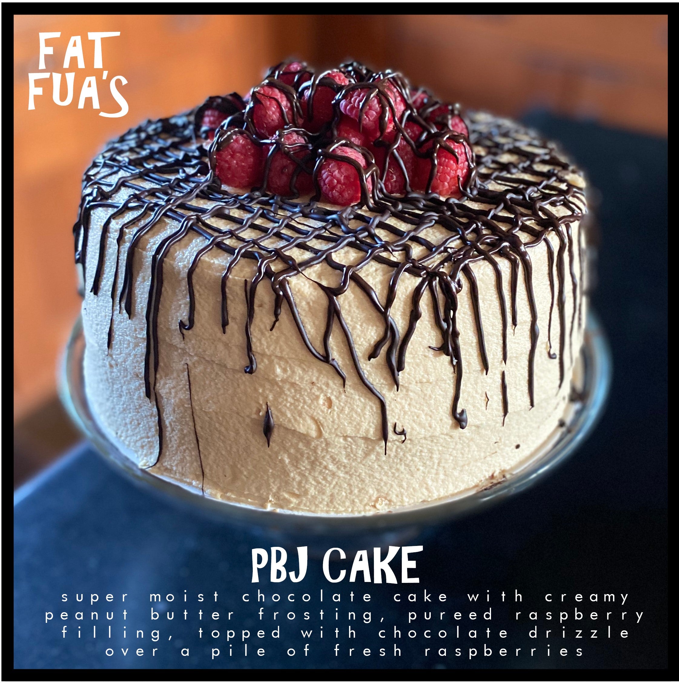 FAT size Super moist PBJ Cake, 2 layers of Chocolate Cake with Creamy Peanut Butter Frosting, pureed Raspberry filling, topped with Chocolate Drizzle over a pile of Fresh Raspberries. 