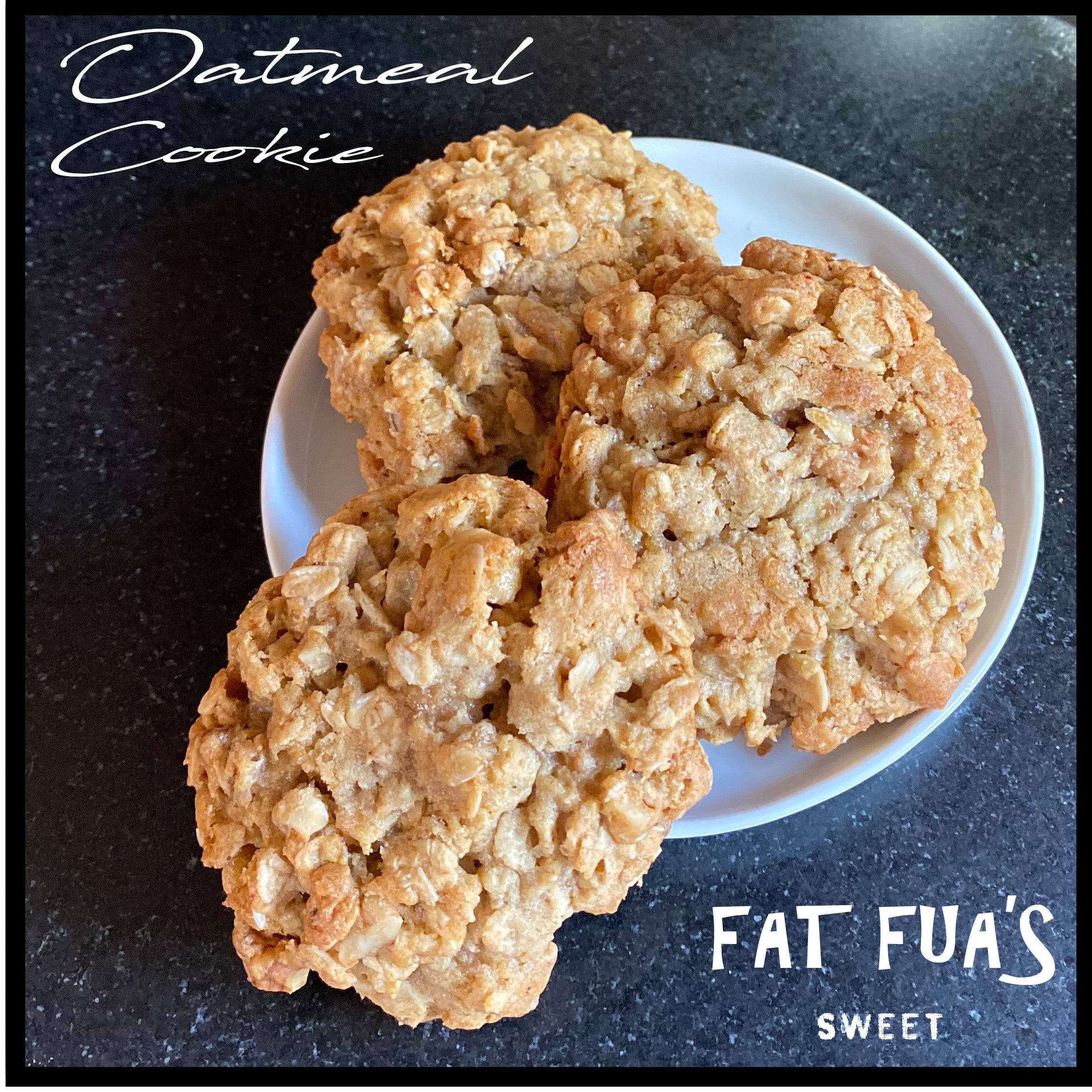 Chunky oatmeal cookies made from all natural ingredients resting on a small white plate